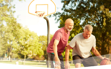 Banner photo at the top of the page showing 2 men playing one-on-one basketball on an outdoor court.  