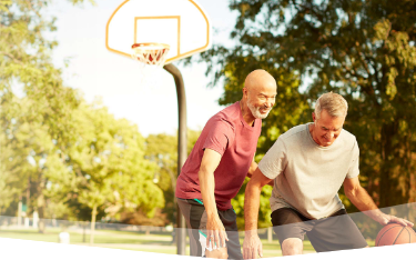 Banner photo at the top of the page showing 2 men playing one-on-one basketball on an outdoor court.