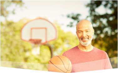 Banner photo at the top of the page showing a man holding a basketball, getting ready to play.  